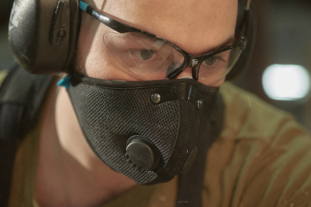 Man wearing safety glasses and mask