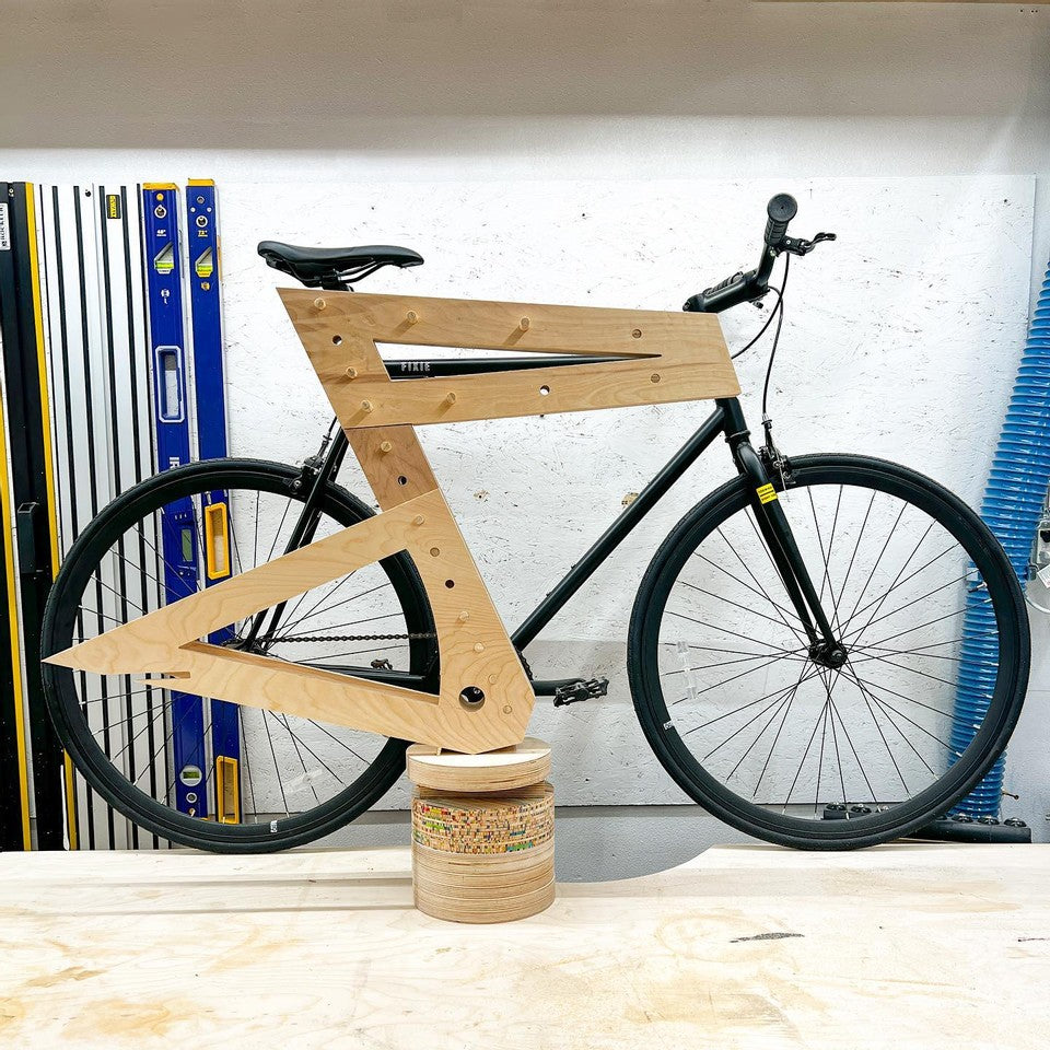 Bike frame on a pedestal designed by Woby