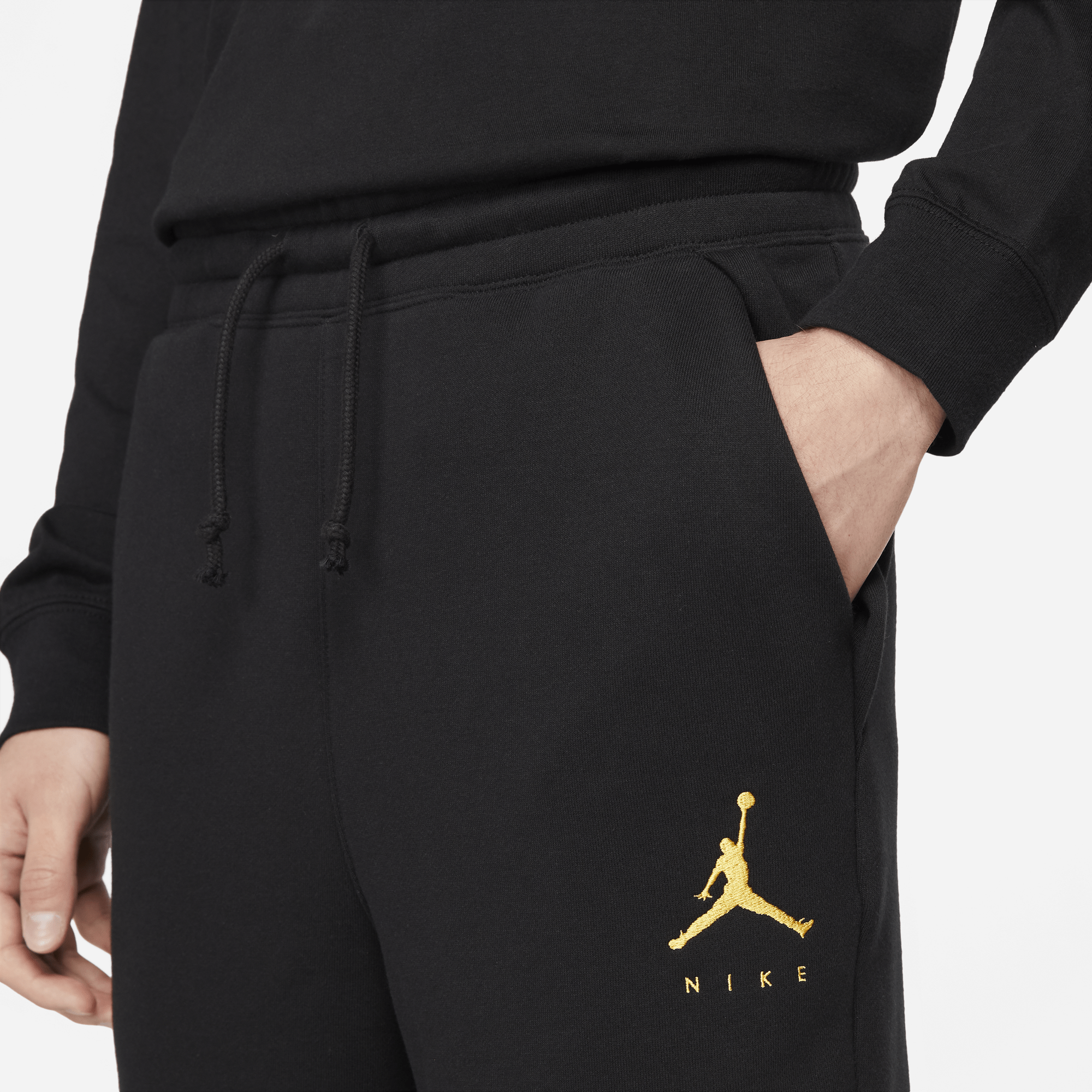 black and gold jordan pants