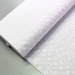 white broderie anglaise fabric