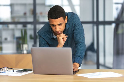 Man focused on laptop