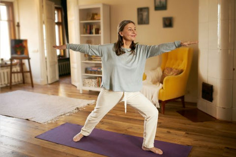 Older woman doing yoga