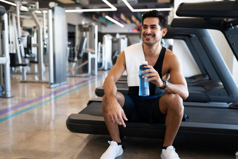 Man drinking after workout