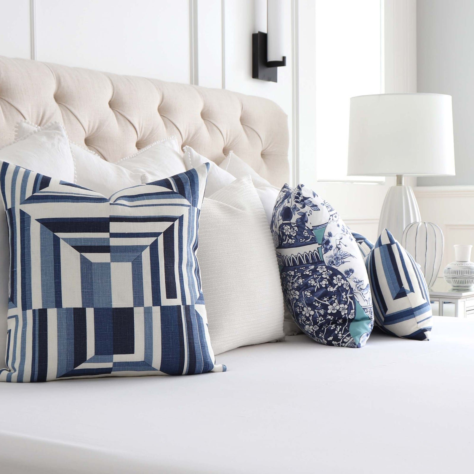 https://cdn.shopify.com/s/files/1/1116/9186/products/Thibaut-Cubism-Geometric-Blue-White-Stripes-Linen-Designer-Luxury-Decorative-Throw-Pillow-Cover-in-Bedroom-with-Matching-Pillows_1600x.jpg?v=1660332637