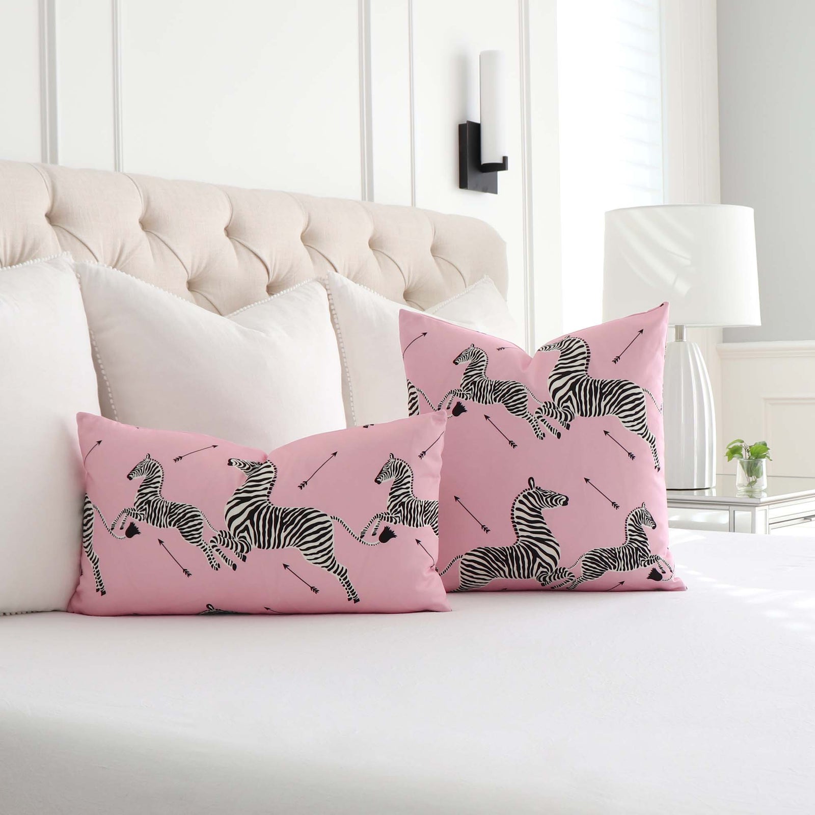 https://cdn.shopify.com/s/files/1/1116/9186/products/scalamandre-zebras-petite-peony-pink-SC000216641-designer-animal-print-throw-pillow-cover-in-bedroom_1600x.jpg?v=1675902538
