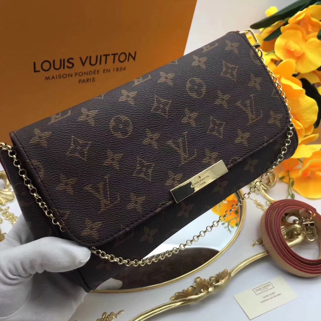 vuitton clutch bolsa