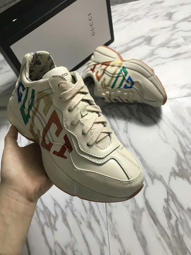 tenis gucci masculino rhyton