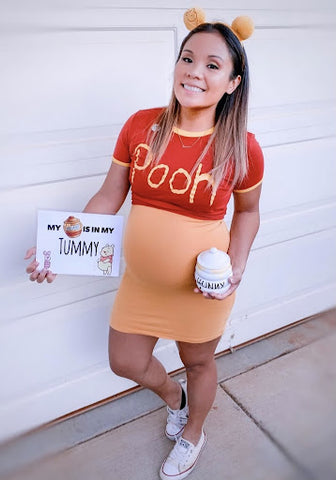 ic:pregnant woman wearing winnie the pooh costume