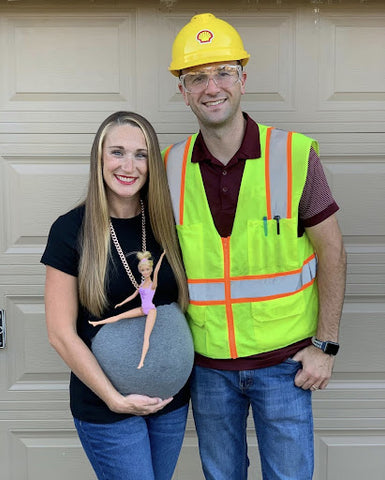 ic:Pregnant woman wearing wrecking ball costume with husband