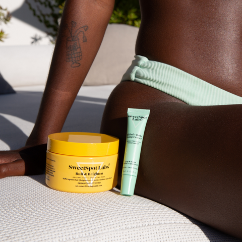 Model with Buff & Brighten and Bikini & Body Bump Eraser: two of the best razor bump treatments