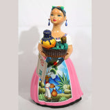 Lupita doll holding Jar of Pulque
