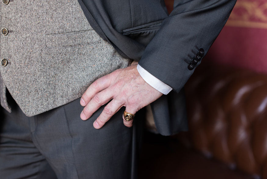 man wearing pinky ring