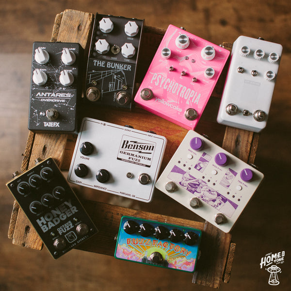 A photograph of a selection of guitar effects pedals from boutique manufacturers