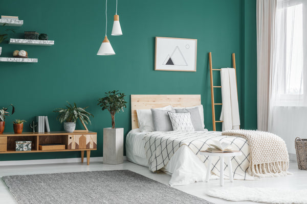 Bedroom aesthetics showcasing bedding trends with sustainable materials in a green boho design