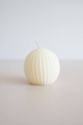 Natural pearl beeswax fluted sphere candle