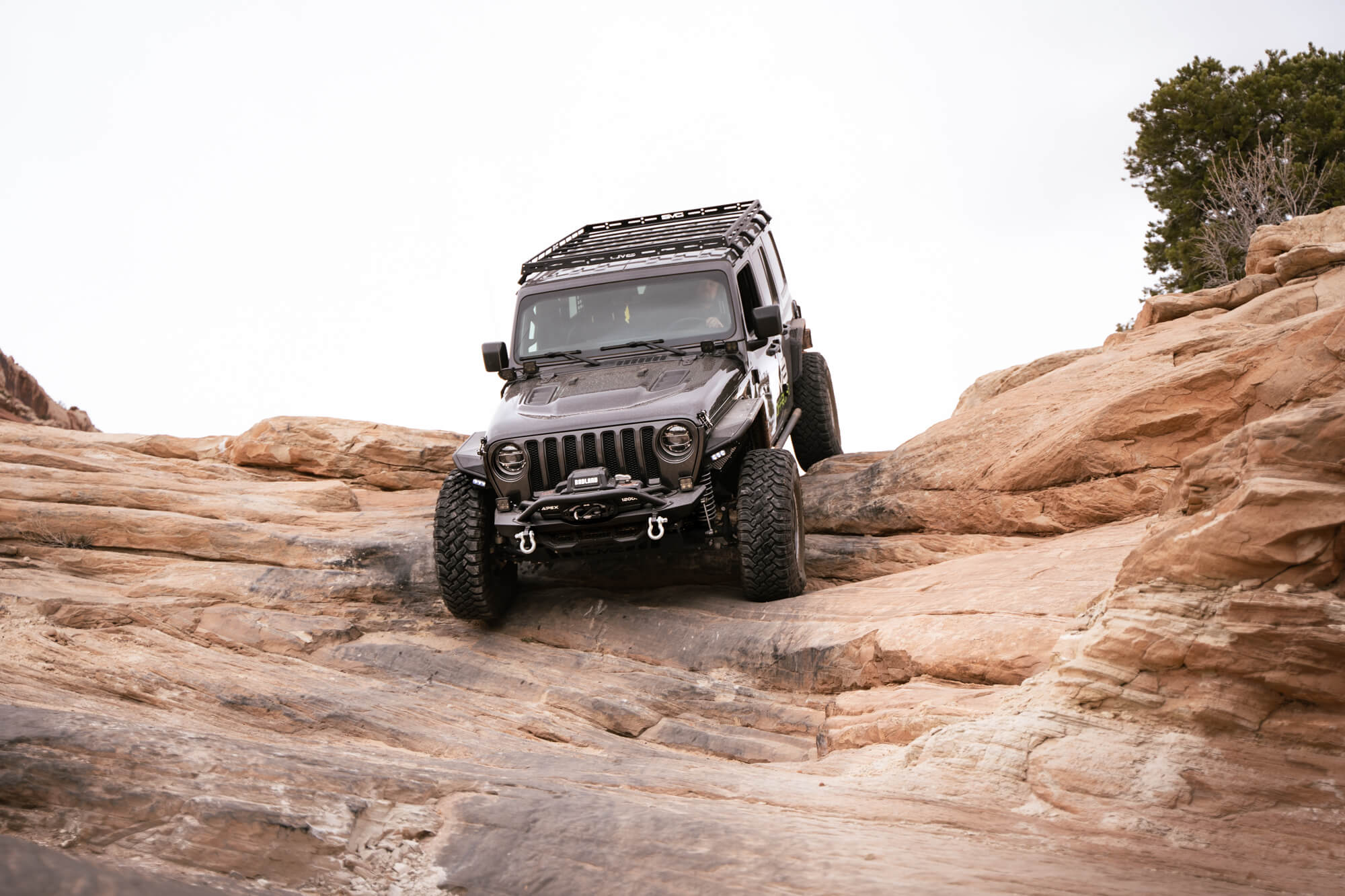 Jeep Wrangler on Wipeout Hill in Moab Utah