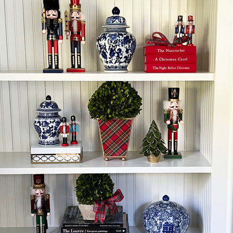 styling bookshelves with nutcrackers and ginger jars for Christmas