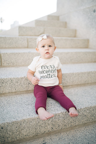 We Rise By Lifting Others - Onesie – Gray & Mae