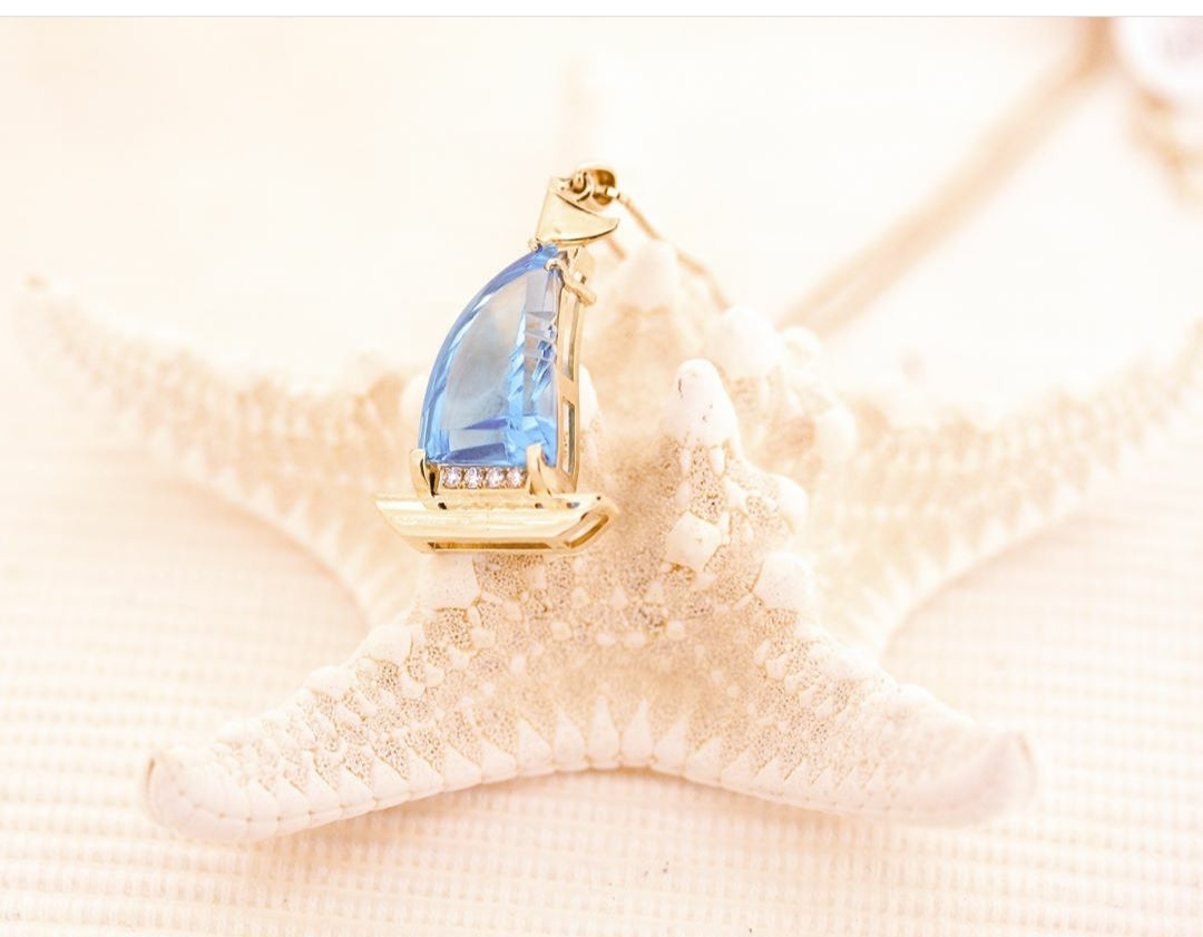 blue topaz sailboat pendant