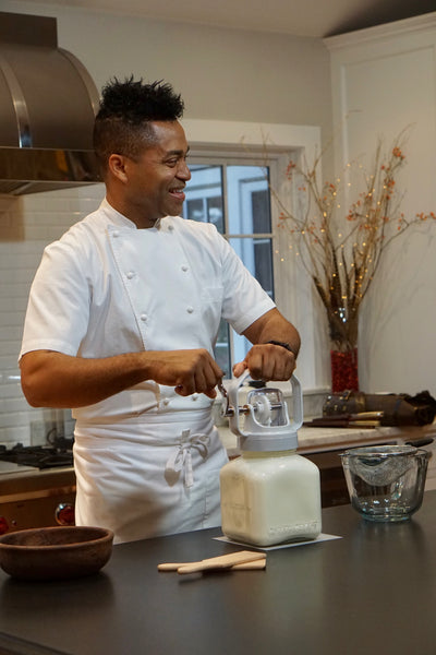 Chef Marlon Alexander churning butter