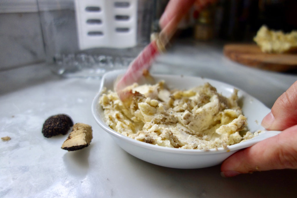 Mixing truffle into homemade butter