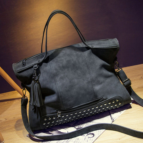 black rivet messenger bag