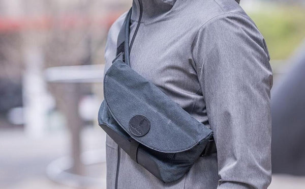 Mean wearing sling bag close