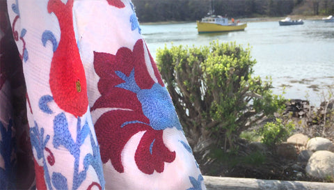 Red white and blue suzani by the sea