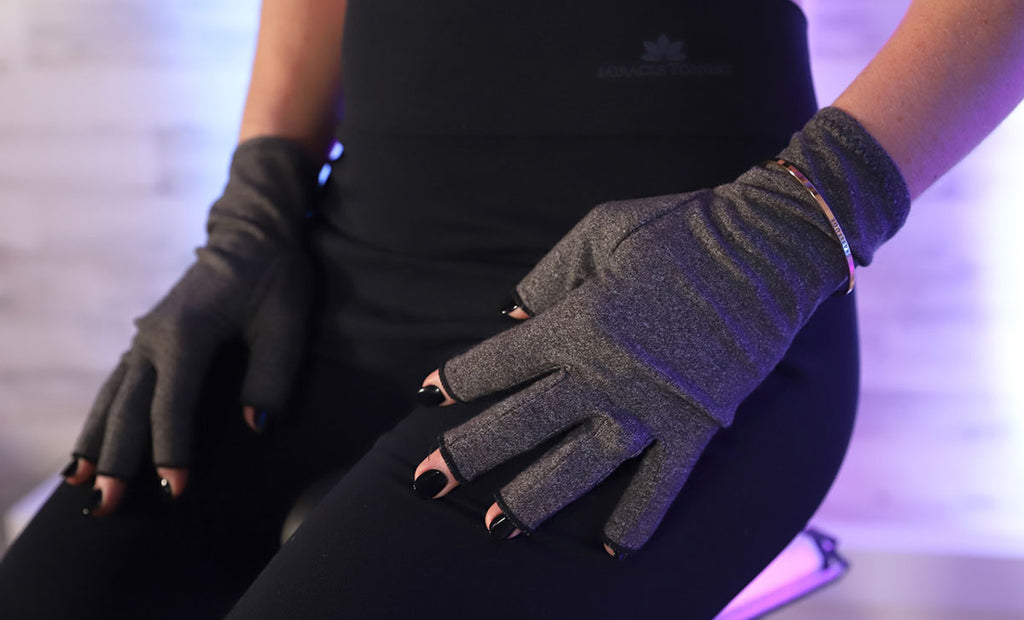 Closeup of a woman wearing beauty gloves