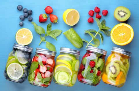 fruit and water filled bottles