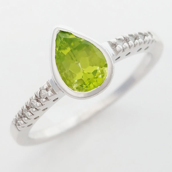 9K SOLID WHITE GOLD 0.80CT NATURAL PEAR CUT PERIDOT RING WITH 8 DIAMONDS.