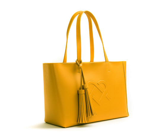 TappooCity - Shopping, Food, Fun & Entertainment for the Entire Family - A  larger-than-life essential, this faux-leather tote bag features dual  shoulder straps and an all over logo print with contrasting stripe