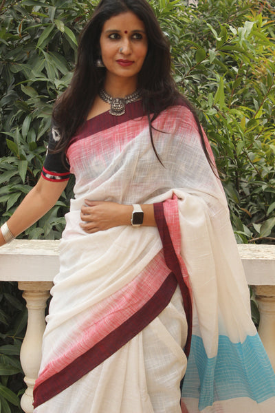 | Happy Colours | White Pure handloom cotton Saree with tasseled pallu.