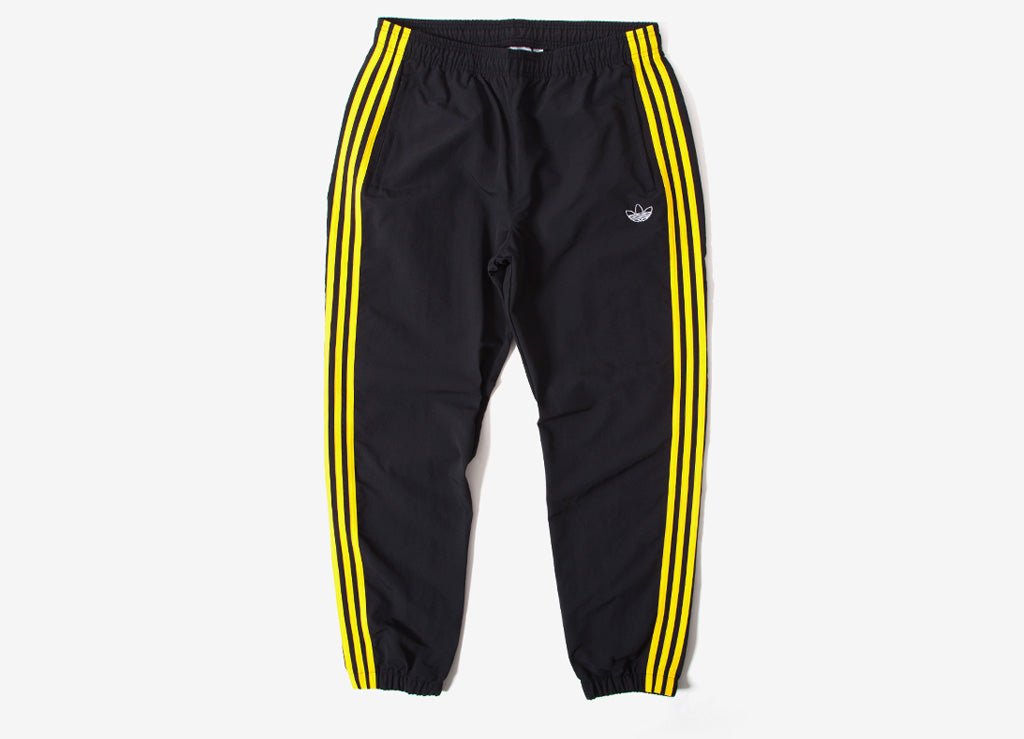 adidas pants with gold stripes