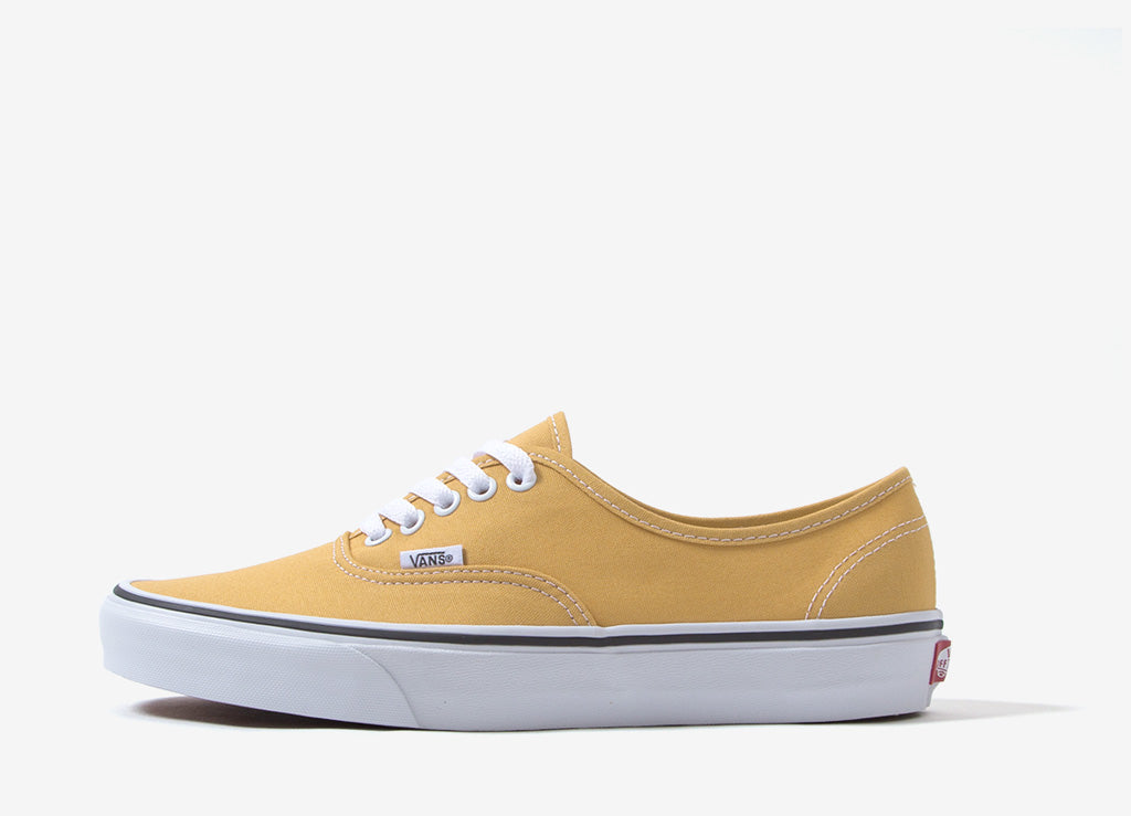 vans slip on ochre and white