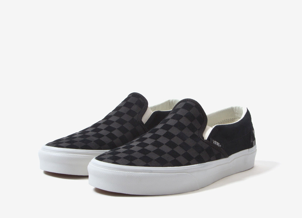 vans slip on checker emboss