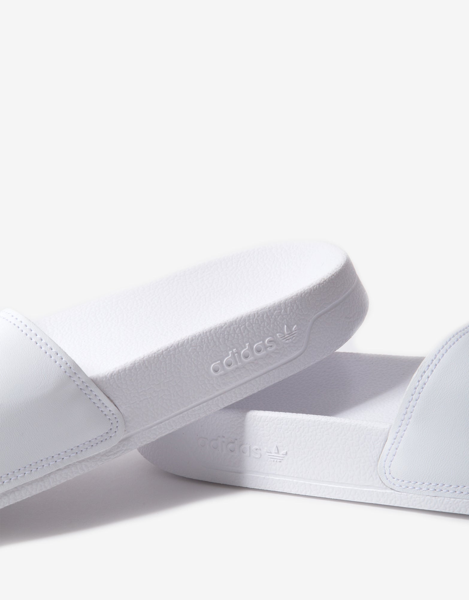 all white adidas slides