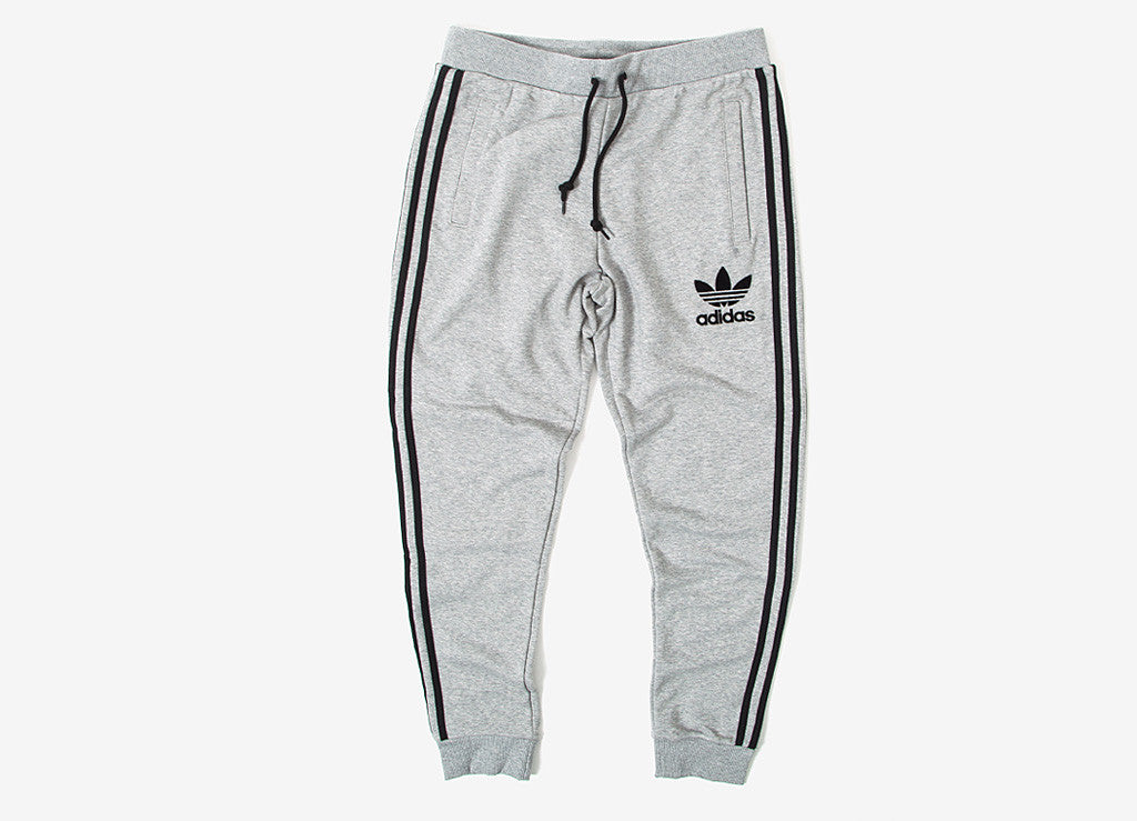 grey and black adidas sweatpants