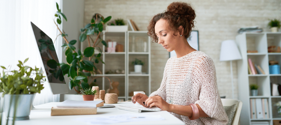 Woman working from home boho chic covid 19 quarantine 