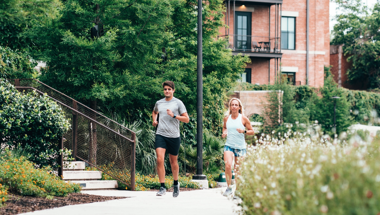 A man and woman running