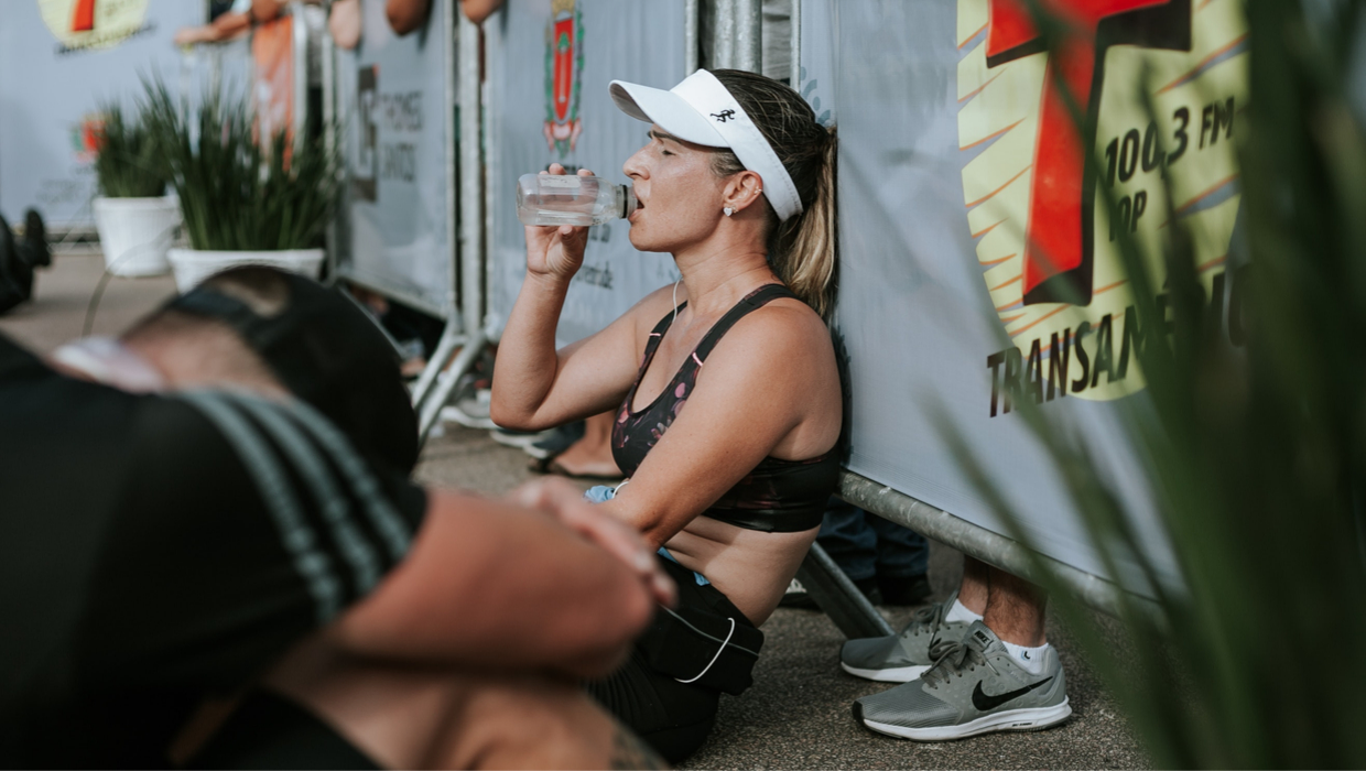 Woman hydrating after a workout