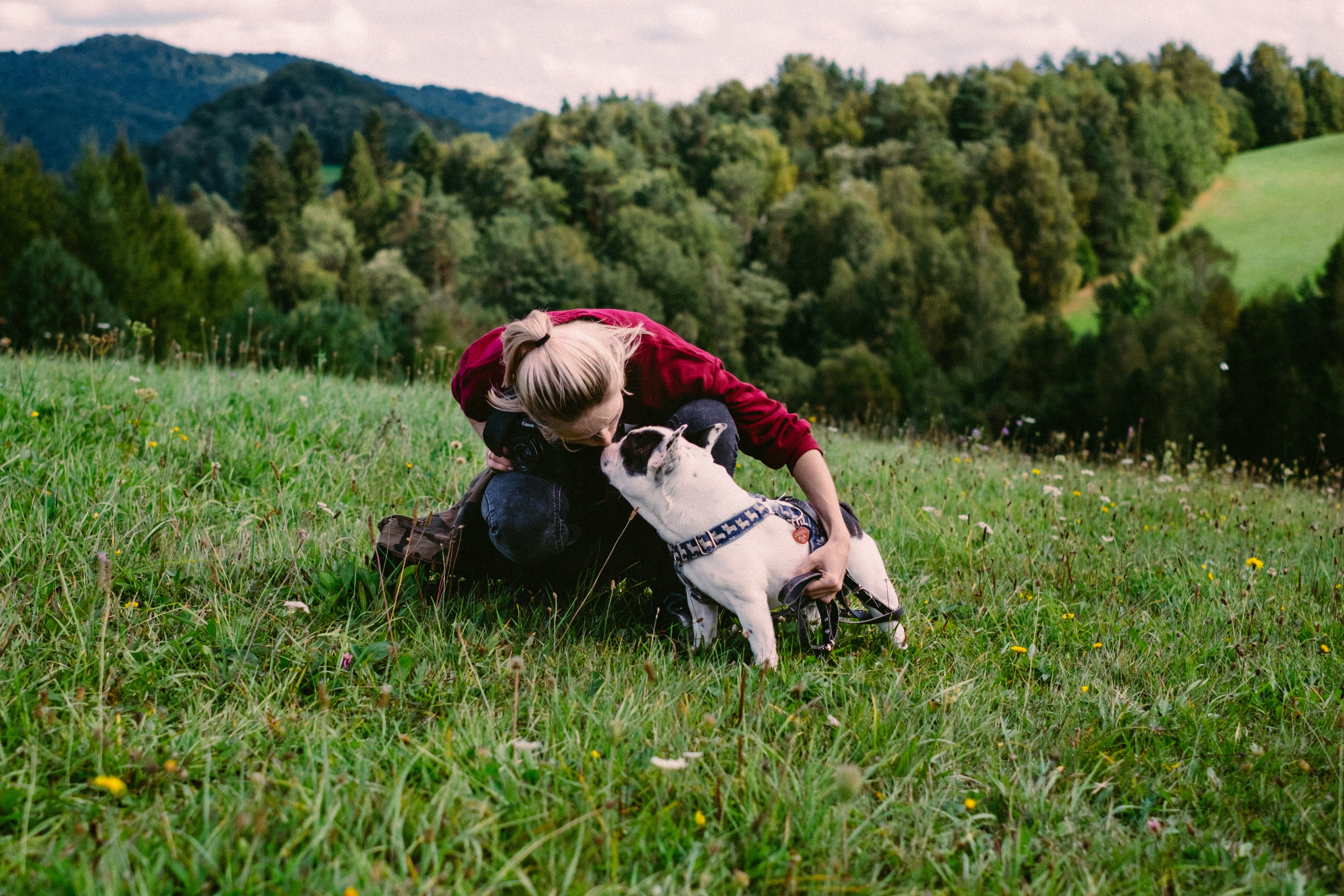 Woman enjoying hiking with her dog