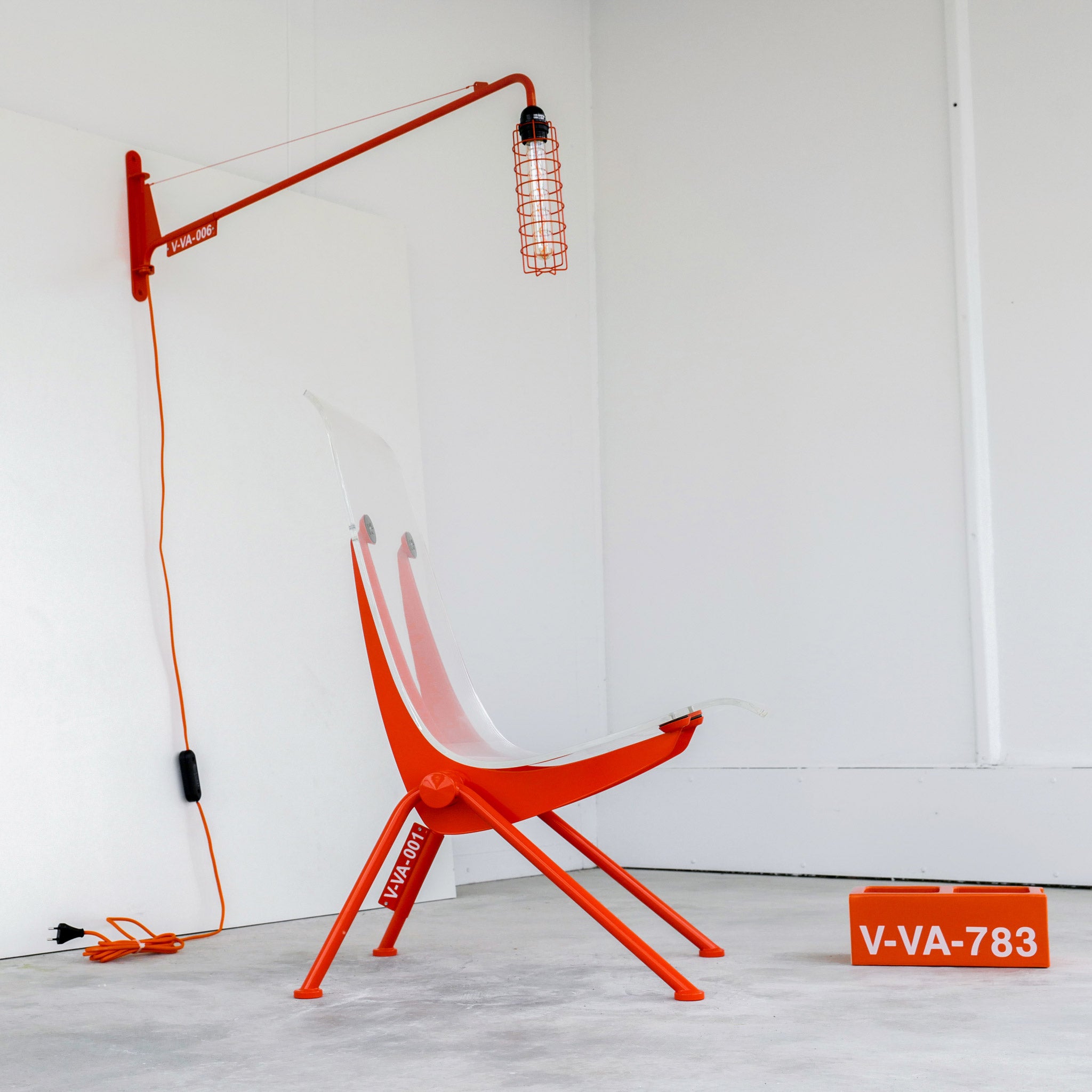Vitra - Virgil Abloh pays tribute to the iconic design of Jean Prouvé's  Antony Chair with an updated version in his installation TWENTYTHIRTYFIVE.  He has transformed the armchair by giving it a