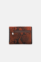 Womens leather wallet in brown colour with snake print and metal plate by JULKE