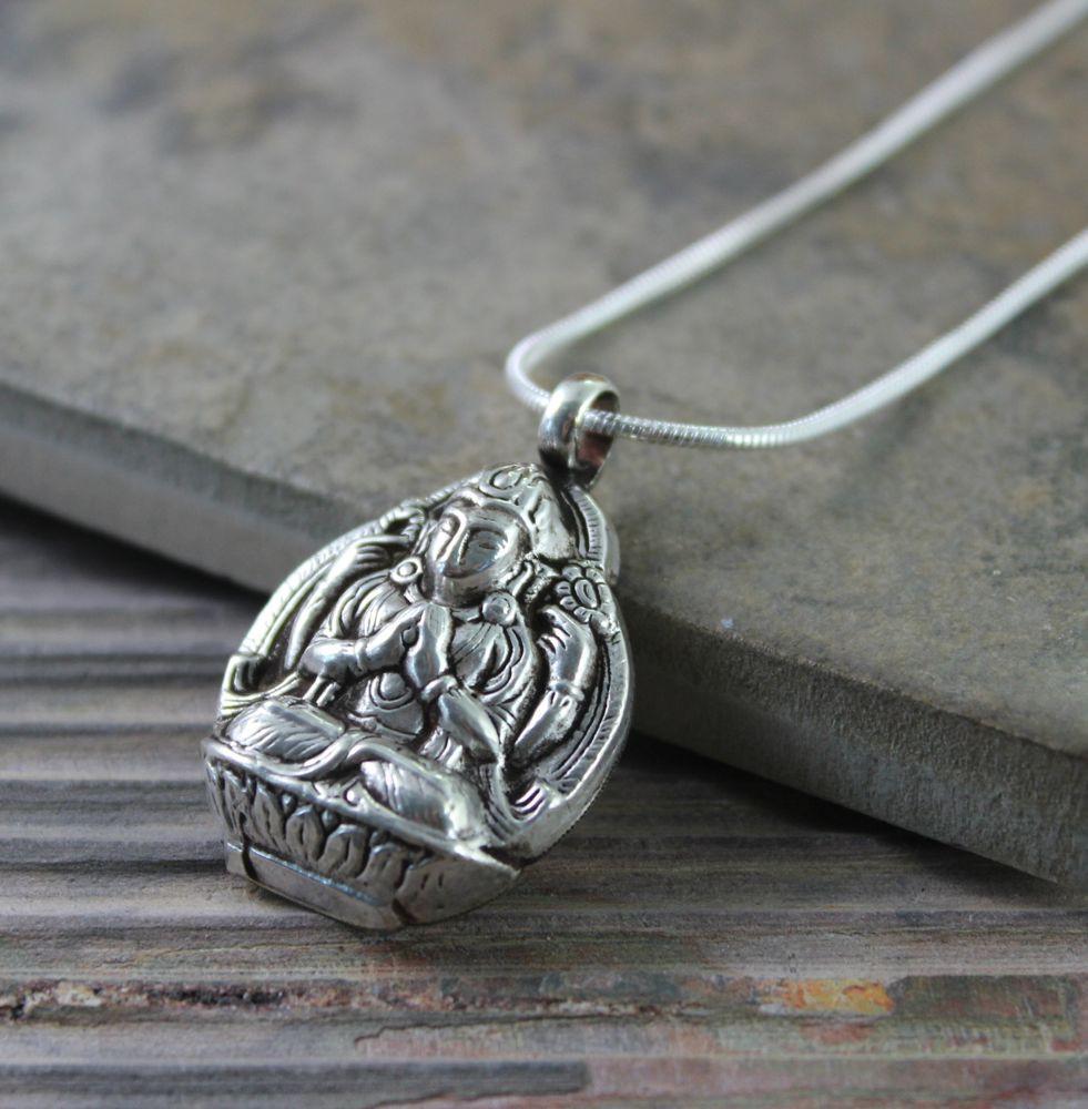 Silver Chenrezig Pendant - DharmaShop