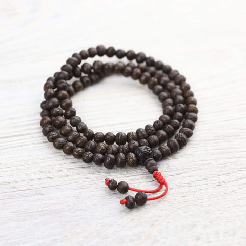 Tibetan Spiral Bead Bracelet With Red Tassel – The Spiritual Planet