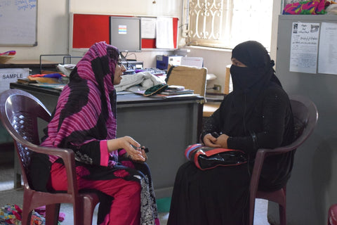 The Little Fair Trade Shop interviewing business woman and designer Yasmeen at the Ra'ana Liaquat Craftmans Colony, Karachi, Pakistan - March 2015