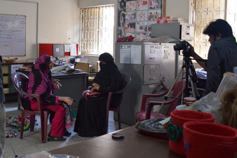 The Little Fair Trade Shop interviewing business woman and designer Yasmeen at the Ra'ana Liaquat Craftmans Colony, Karachi, Pakistan - March 2015