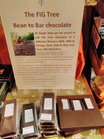 Fredrick fairtrade farmer with Kuapa Kokoo and his cocoa beans used to produce The FIG Tree chocolate