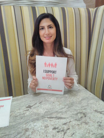 Anna Sadeghpour supporting global goal 1 No Poverty for Anti Poverty Week in the UAE with the Lilfairtrade Shop